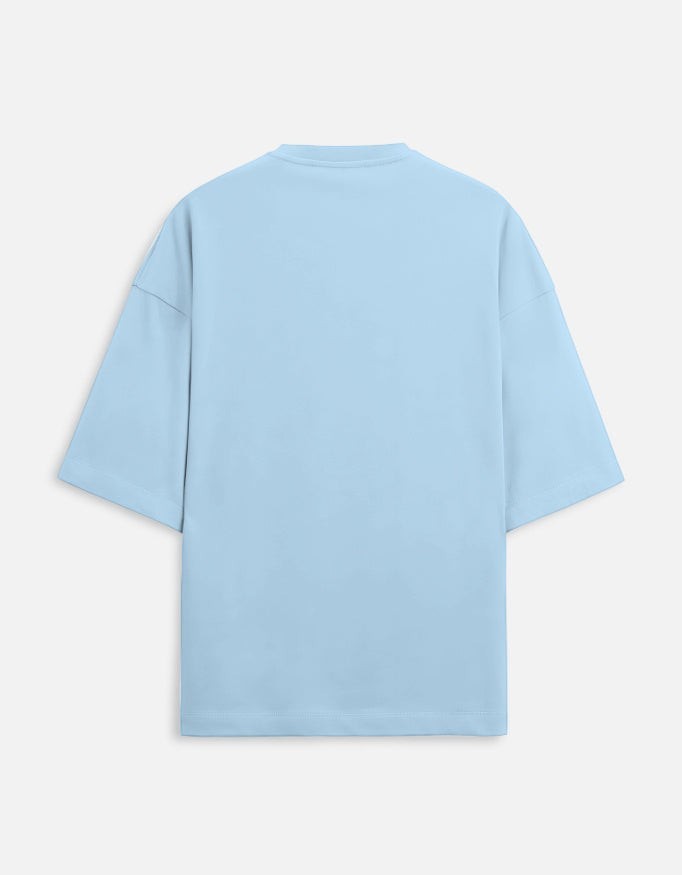 Snuggle Spot light blue unisex oversized terry-knit t-shirt with drop shoulders and a premium structured fit.