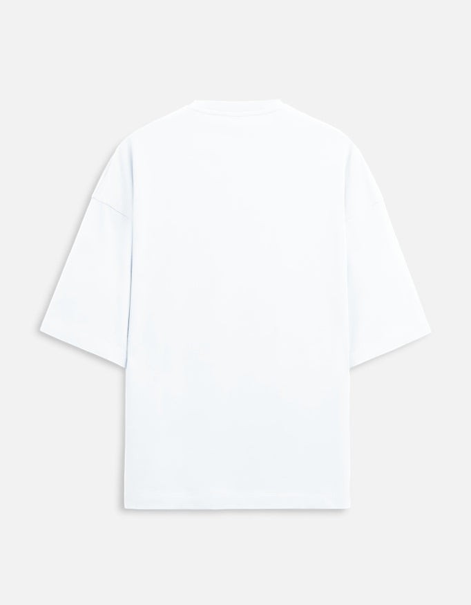 Snuggle Spot unisex oversized terry-knit t-shirt in a light shade with drop shoulders and a structured fit.