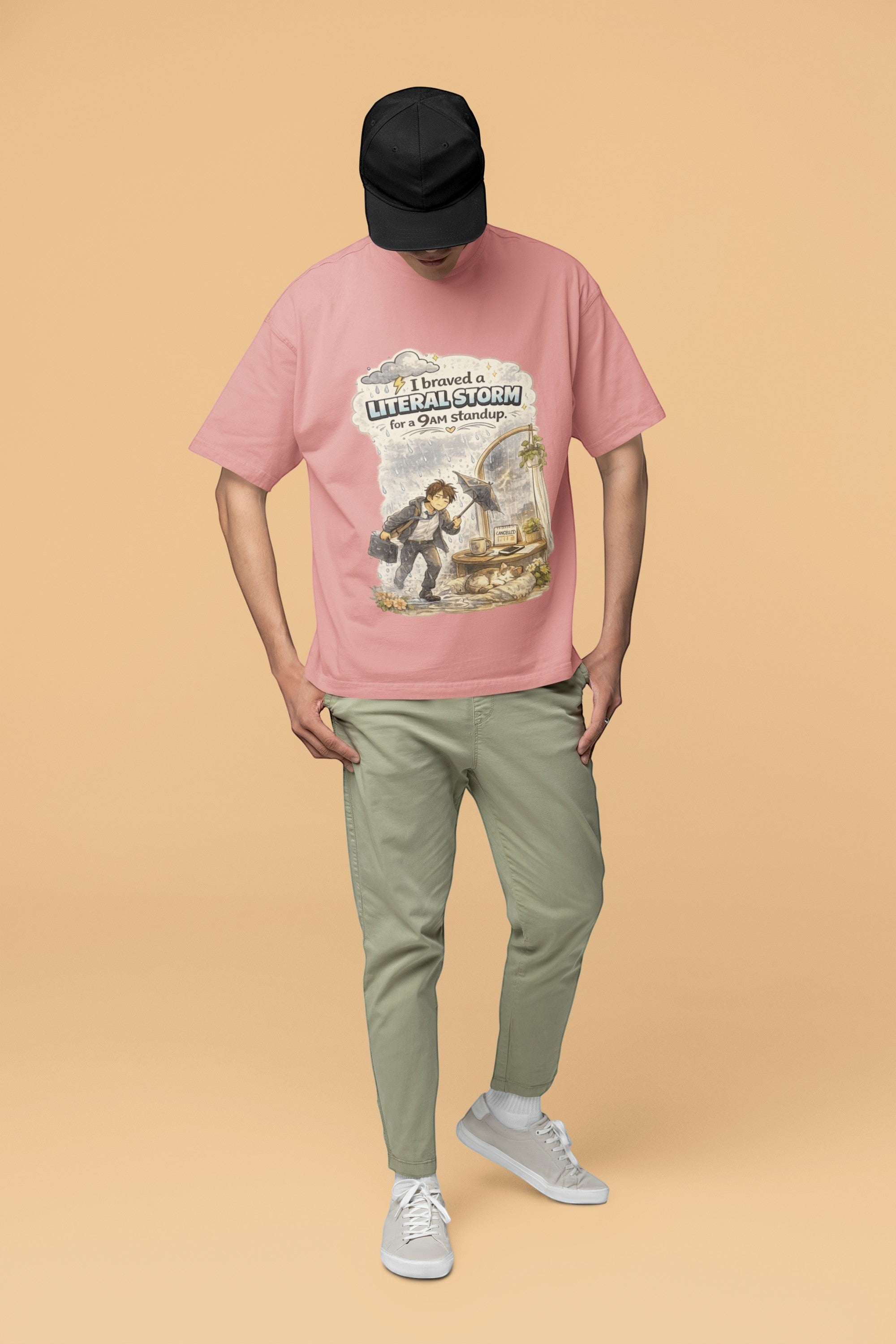 Snuggle Spot pink oversized unisex t-shirt with graphic print, featuring drop shoulders and premium terry-knit fabric.