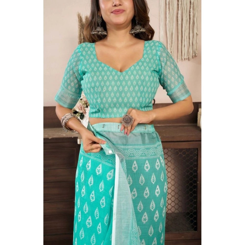 Snuggle Spot Sea Green faux linen saree with white leaf print and unstitched blouse piece.